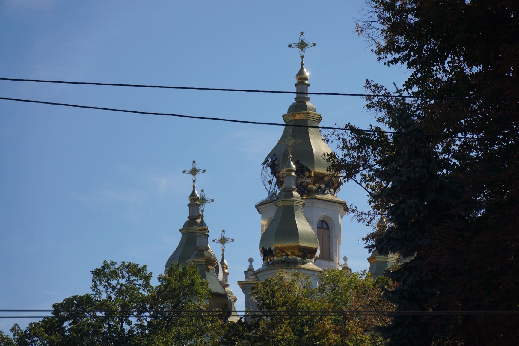 The partially destroyed dome of a Russian Orthodox Church belonging to the Moscow Patriarchate